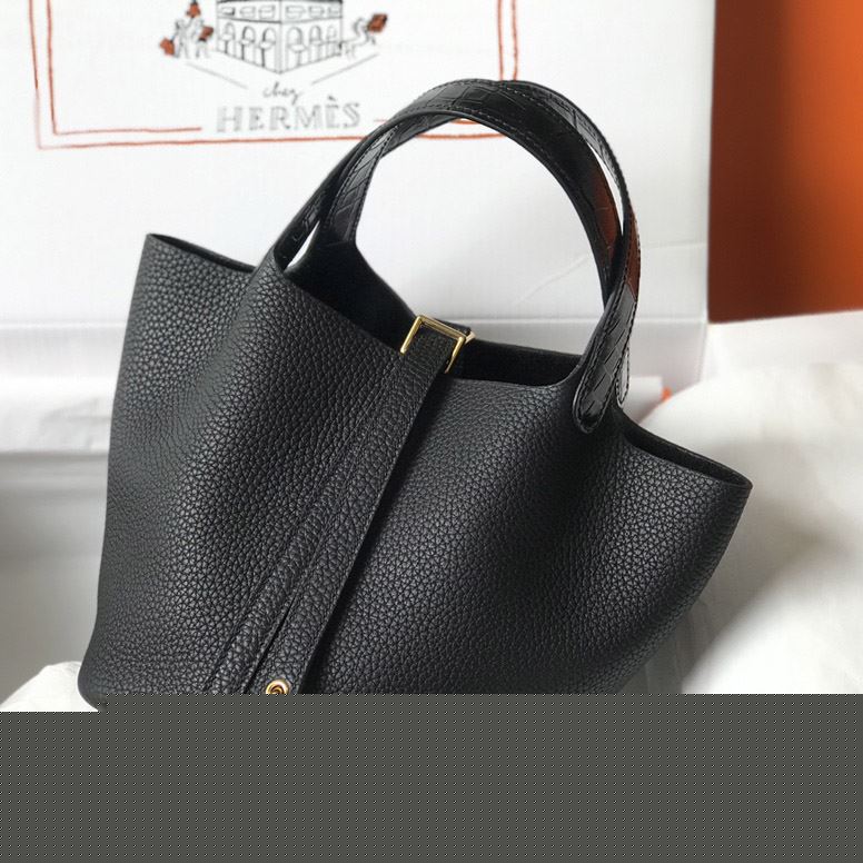 H**mes shopping bags